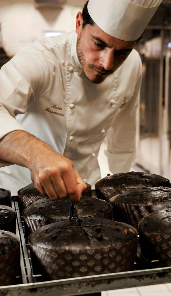 A Fiasconaro pastry chef working on panettoni